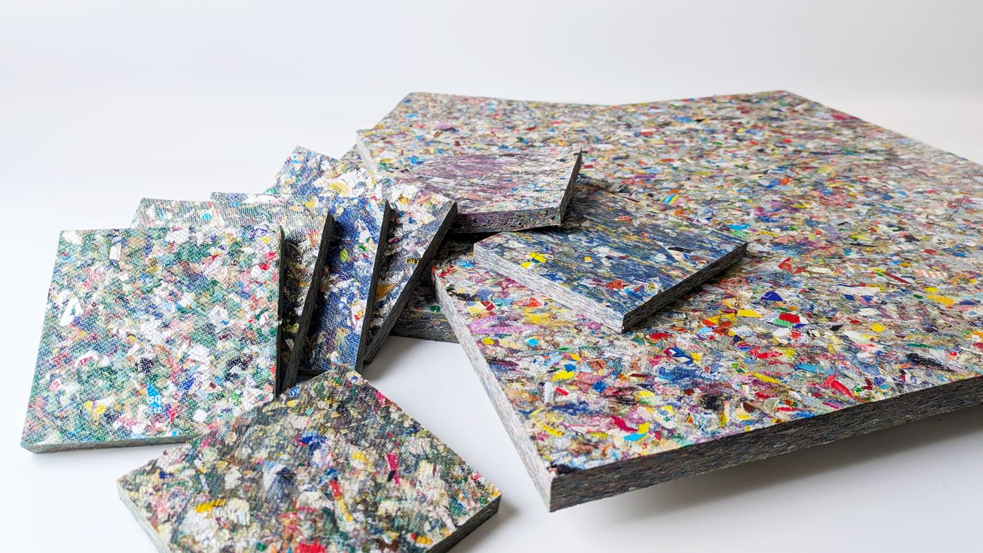 Stack of RiverRecycle Boards showing the multicoloured recycled plastic surface