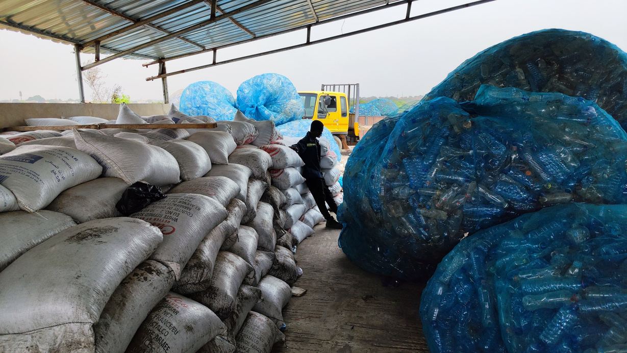 Bales of recovered PET bottles in a warehouse in Accra