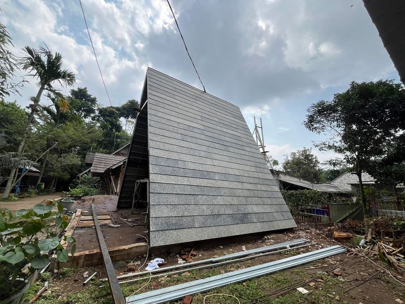 A-frame structure clad in recycled boards